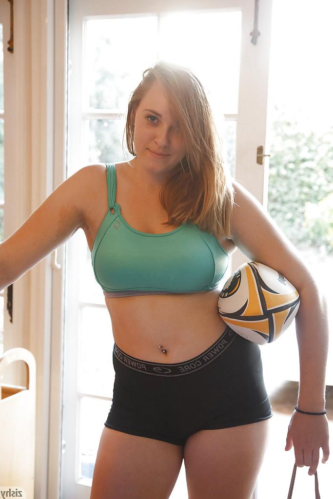 12P Chunky amateur coed Deidre Collins posing in spandex shorts and knee highs