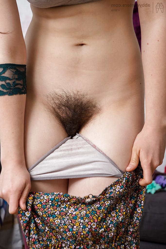 16P Glasses adorned amateur babe spreading hairy snatch in long socks