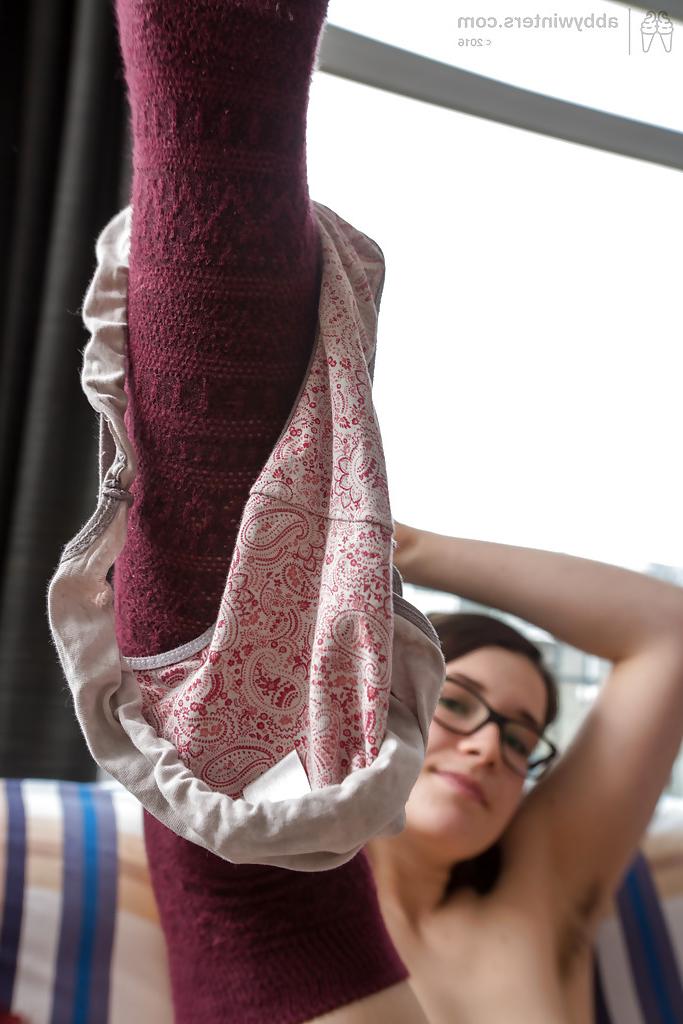16P Glasses adorned amateur babe spreading hairy snatch in long socks
