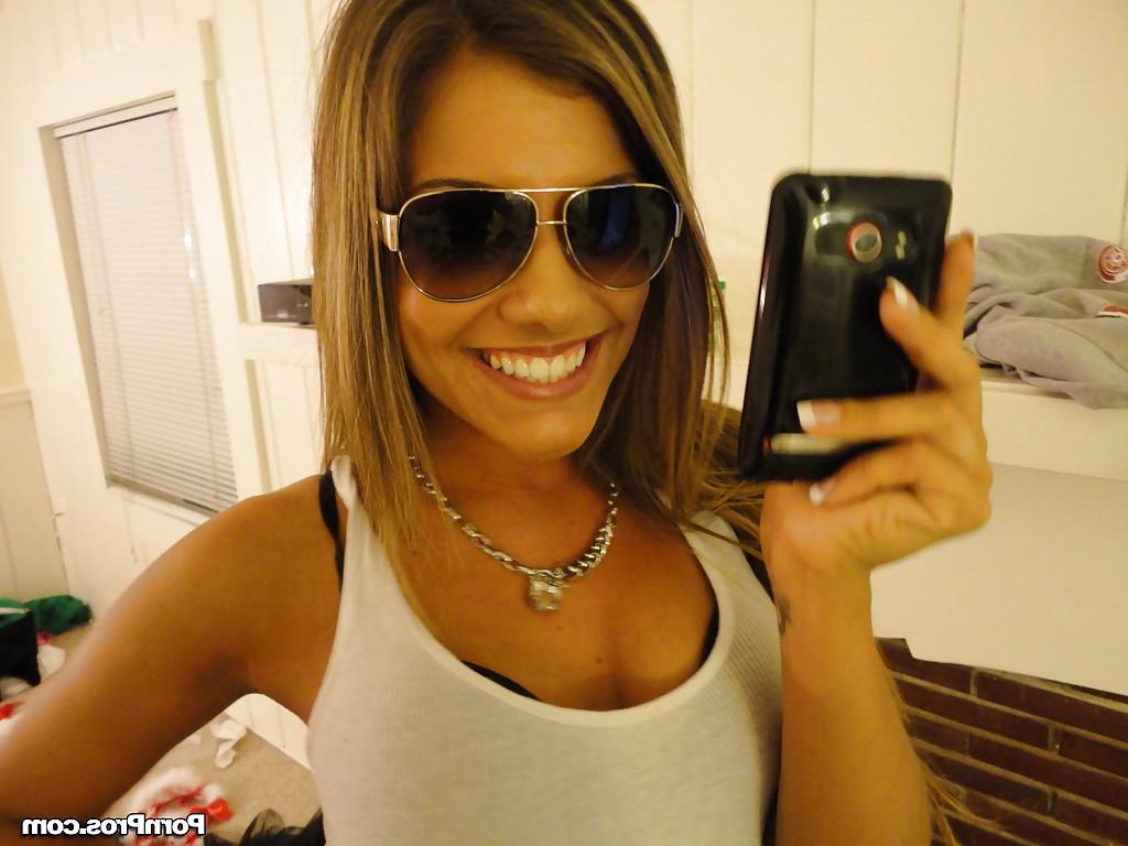 16P Amateur Bella Beyle strips to make some homemade shots in lingerie