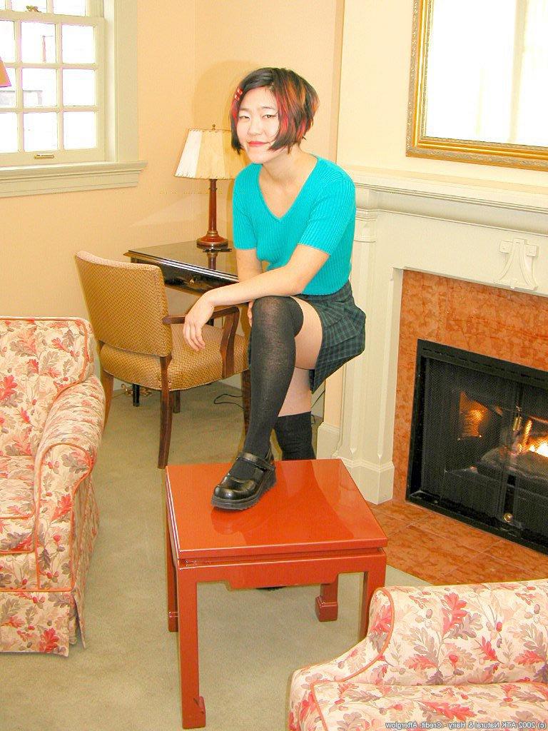 16P Amateur Asian in over the knee nylons sheds panties to expose hairy pussy