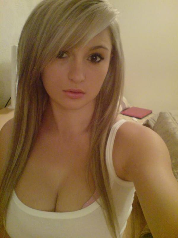 10P Busty amateur hottie displays her big breasts