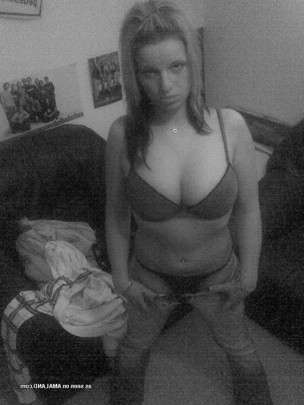 14P Big-tittied chick teasing on cam while showing her breasts