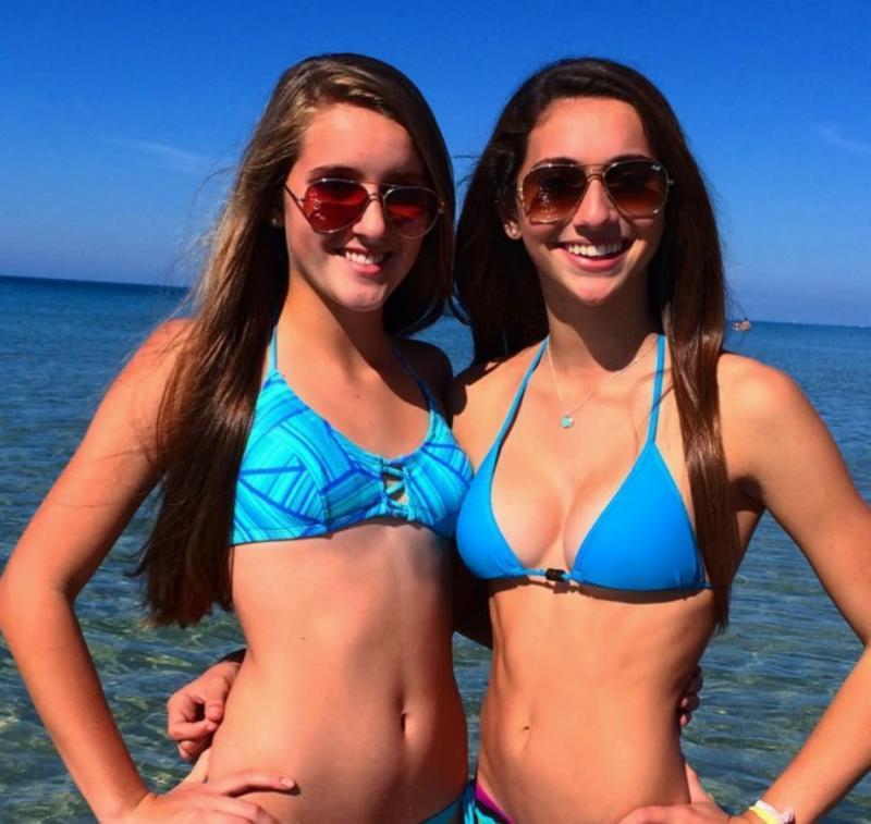 14P Hot girls posing for the cam while in hot and skimpy bikinis