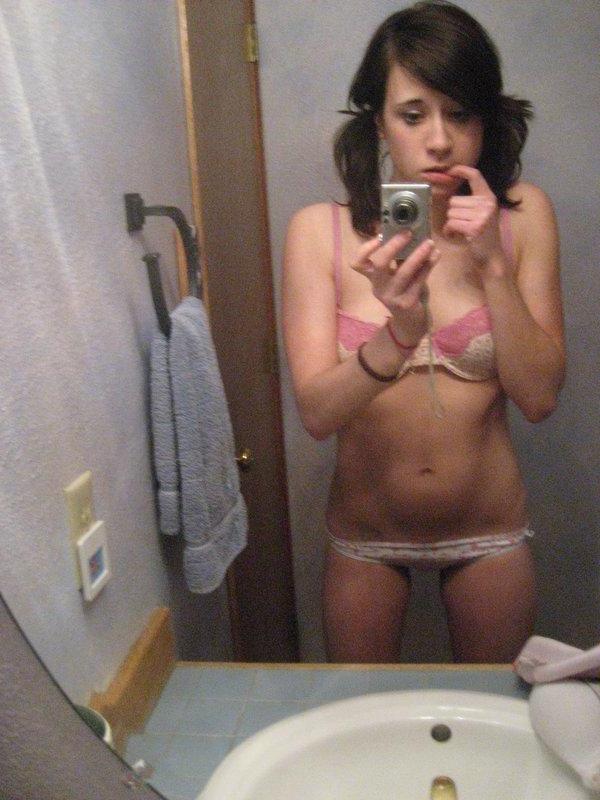 15P Hot college coed takes selfies in the bathroom