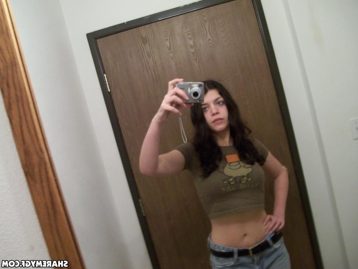 20P Amateur brunette coed shares some hot selfies of her having fun at home