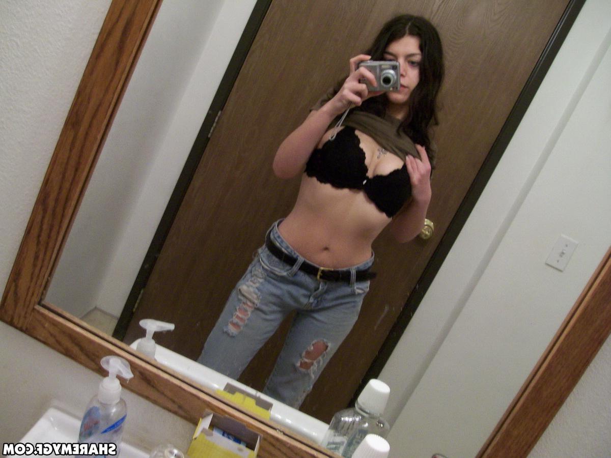 20P Amateur brunette coed shares some hot selfies of her having fun at home