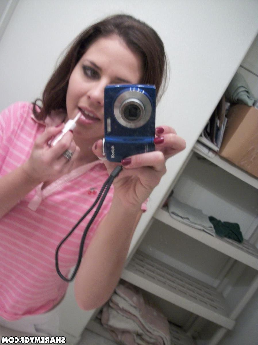 20P Brunette teen strips naked in the bathroom and takes some selfies