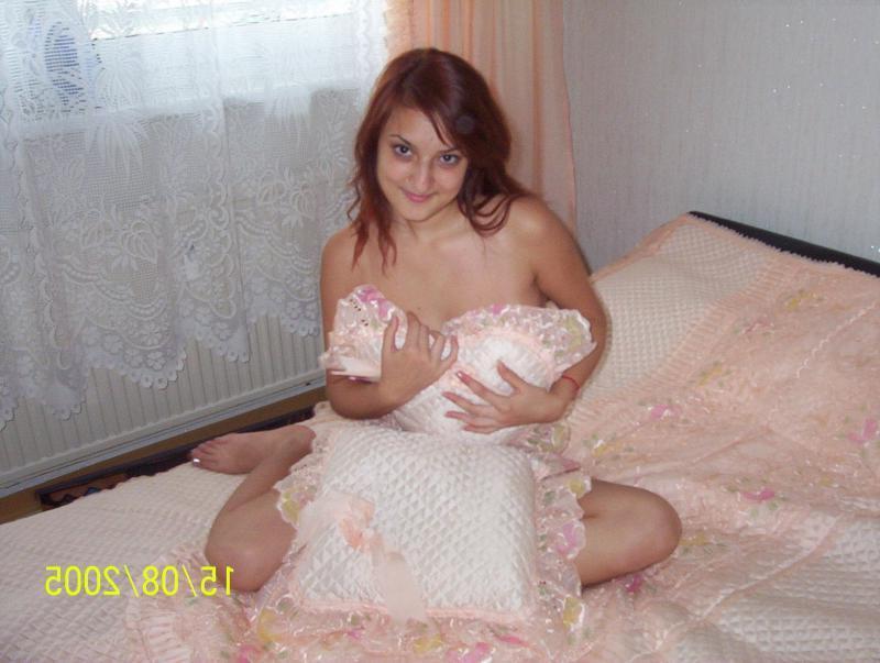 14P Naughty amateur babe goes topless on camera
