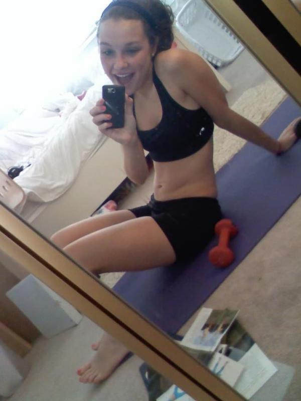14P Horny amateur babe with round tits teasing and posing