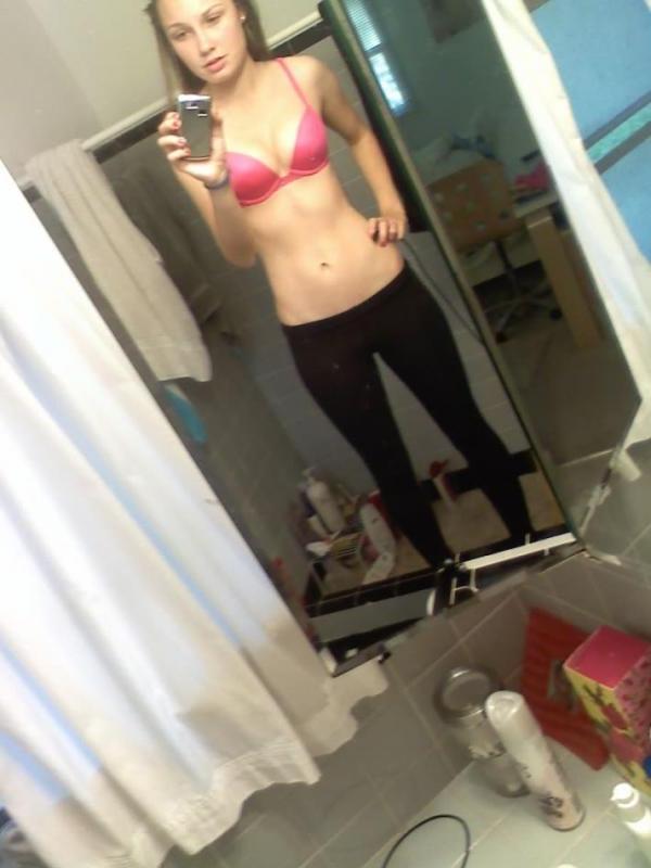 14P Horny amateur babe with round tits teasing and posing