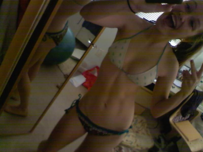 14P Horny amateur babe with round tits teasing and posing