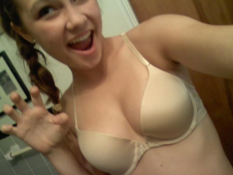 14P Horny amateur babe with round tits teasing and posing