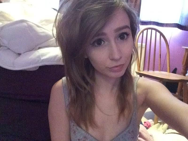 14P Naughty amateur hottie with pierced nips posing topless