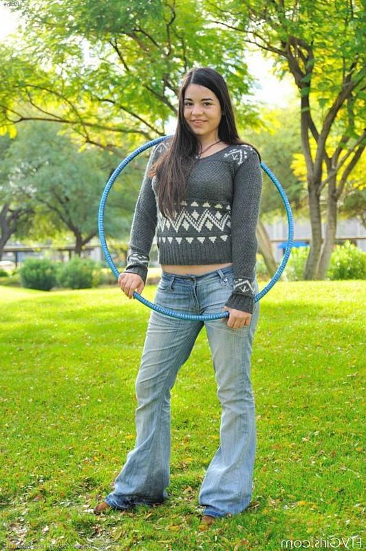15P Cute amateur teen hula hoops nude in a public park