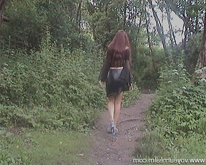 15P Hot amateur babe in short skirt in the forest
