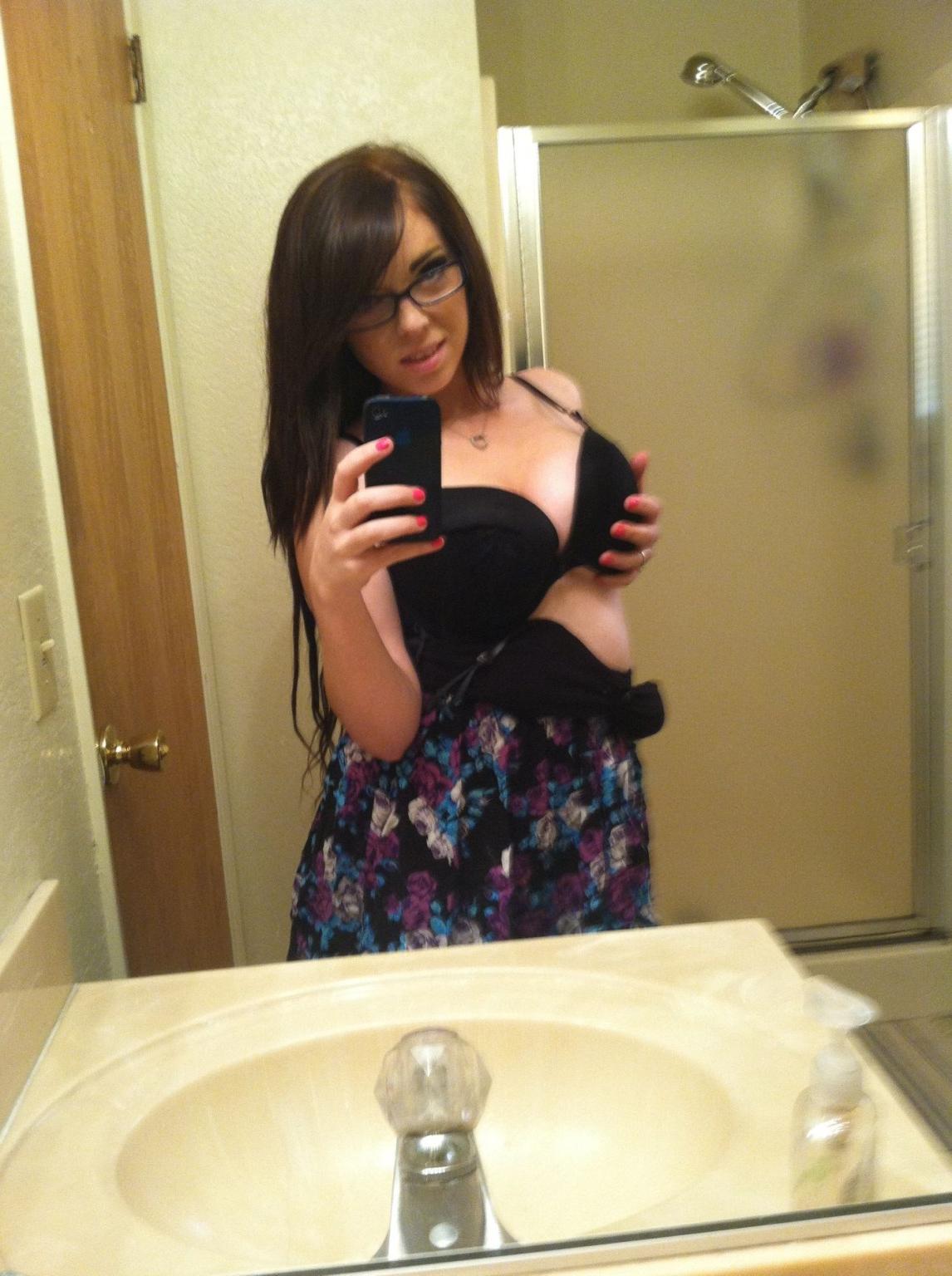 12P Cute Amateur Brunette taking selfies in the bathroom