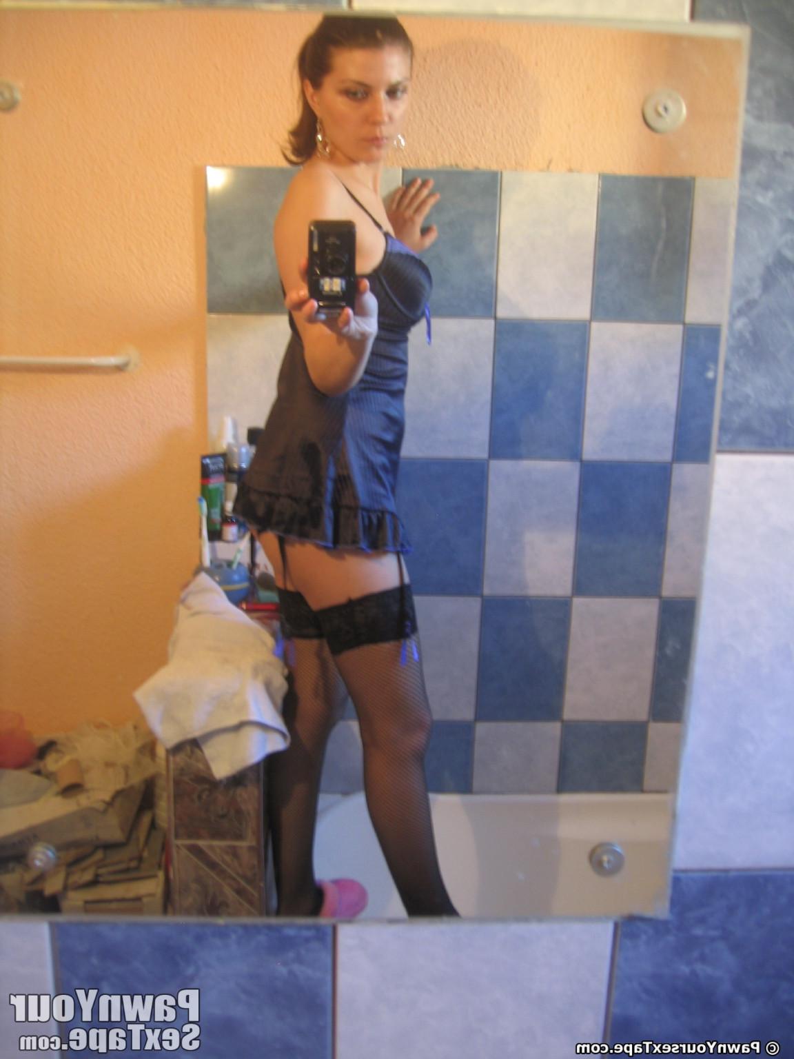 15P DD Lory plays dressup and show her pussy to the cam in the bath mirror