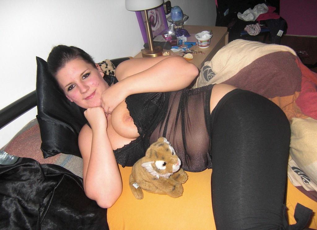 14P Busty amateur babe with big round boobs on a bed
