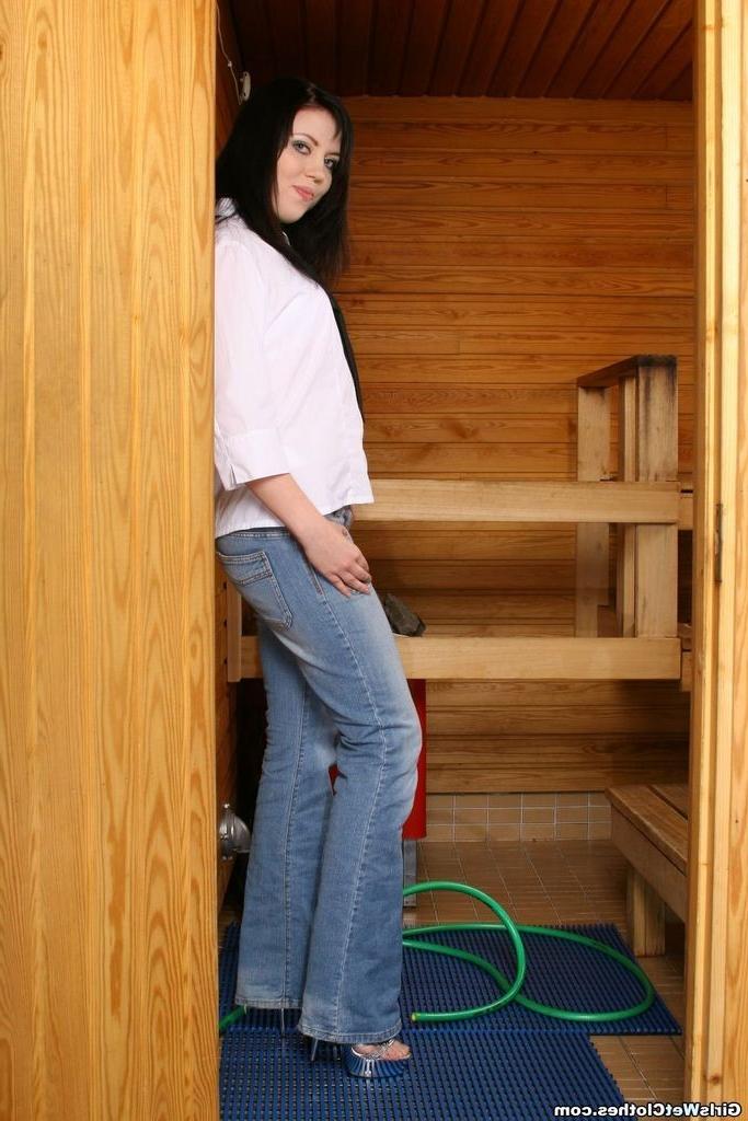 20P Cute shy girl in wet jeans