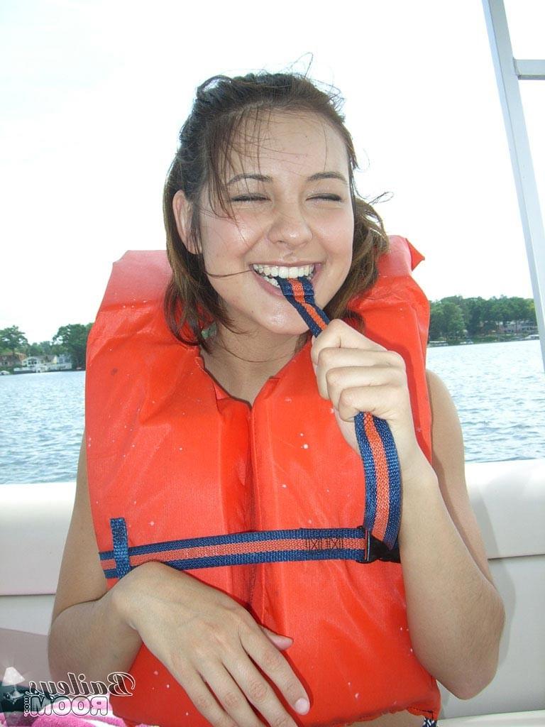 16P Real amateur teen girl boating topless