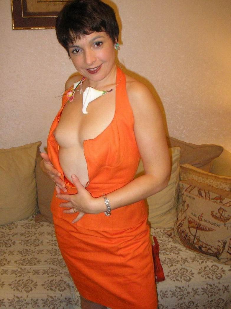 15P Amateur housewife Nathalie posing in gray stockings