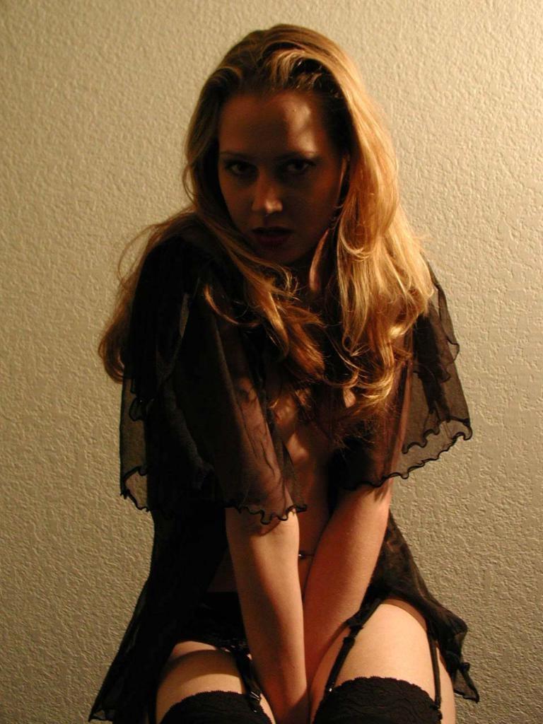 20P Horny amateur in sexy lingerie teasing in her stockings