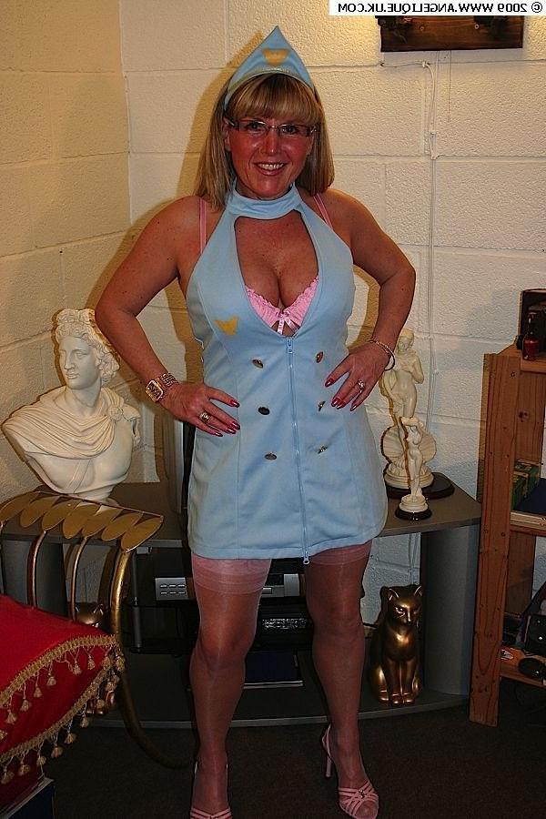 12P Amateur smoking nurse Angelique in stockings