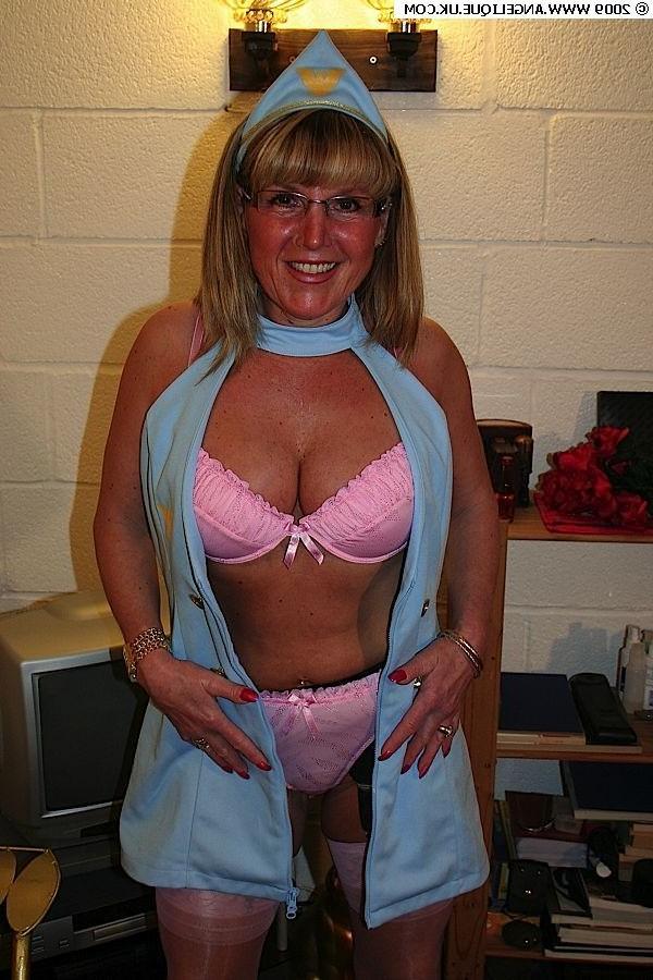 12P Amateur smoking nurse Angelique in stockings