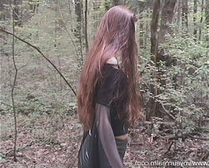 15P Amateur babe in short skirt in the forest