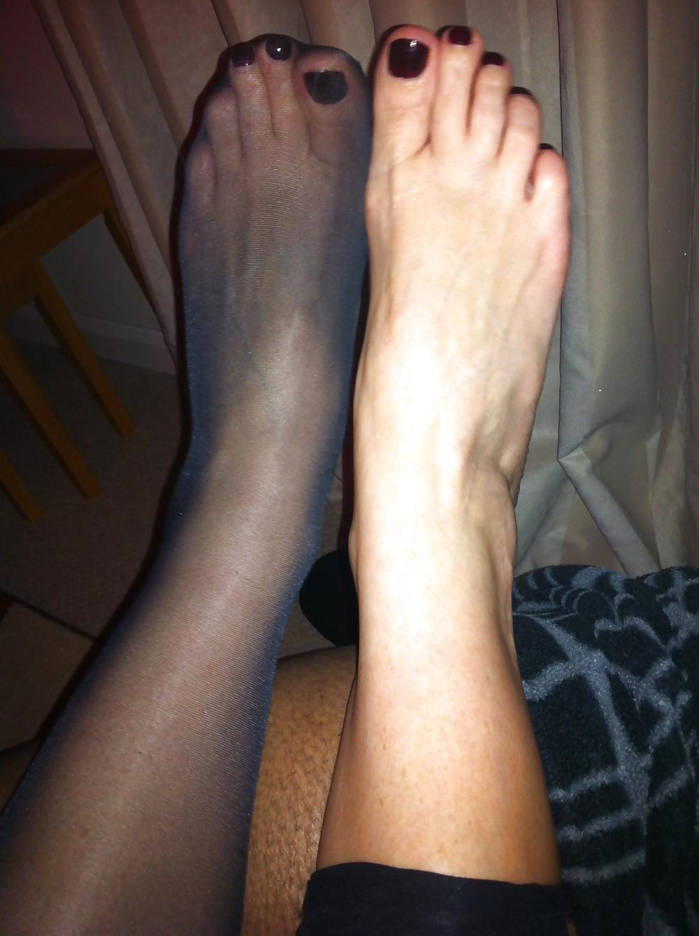 15P Her sexy feet in and out of her hold ups
