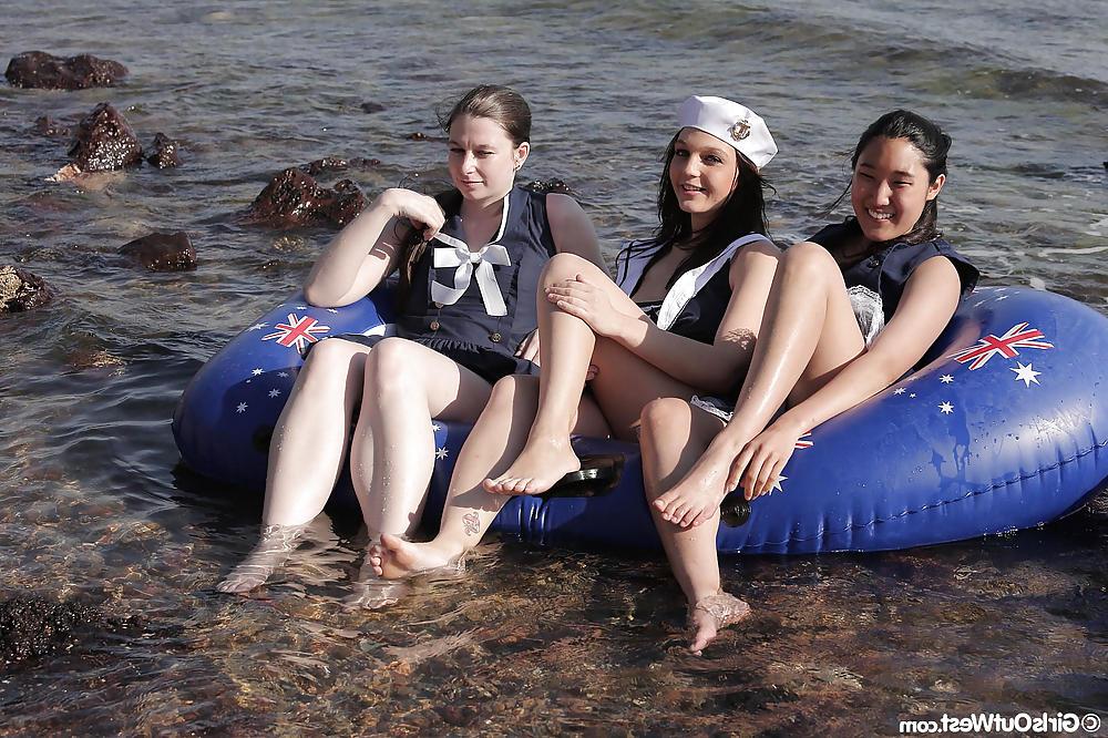 16P Three amateur lesbian sailors lick each other at the beach