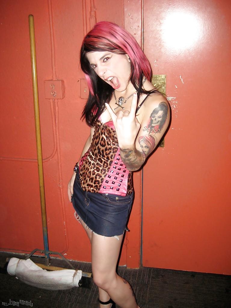 16P Clothed amateur milf Joanna Angel dose a sexy striptease dance