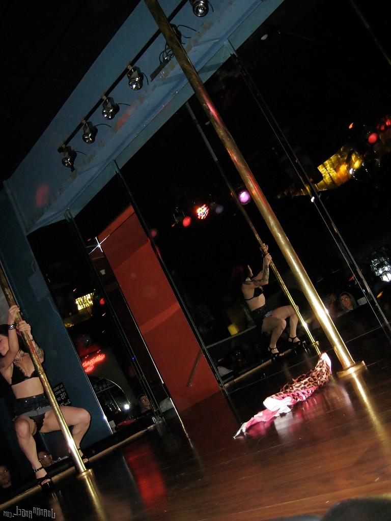 16P Clothed amateur milf Joanna Angel dose a sexy striptease dance