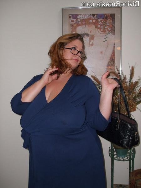 15P Plump amateur milf secretary lets giant boobs hang out