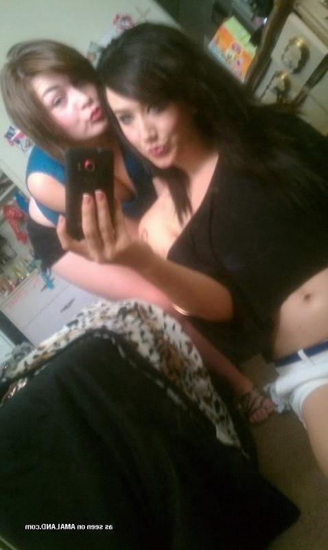 14P Camwhoring lesbian BFFs posing slutty at home