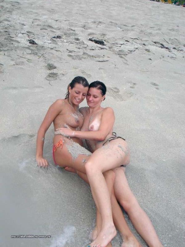 15P Picture selection of naughty amateur bikini lesbos getting wild outdoors 