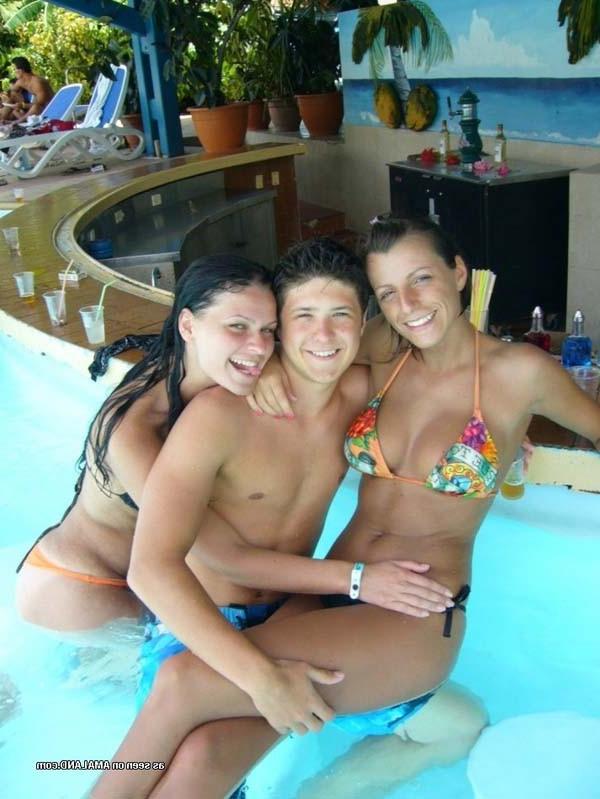 15P Picture selection of naughty amateur bikini lesbos getting wild outdoors 