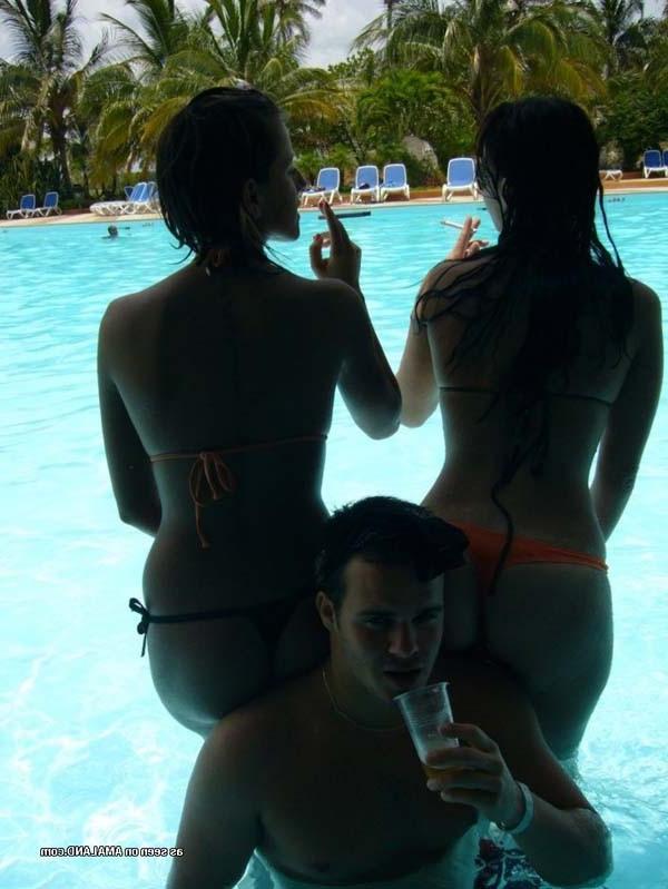 15P Picture selection of naughty amateur bikini lesbos getting wild outdoors 