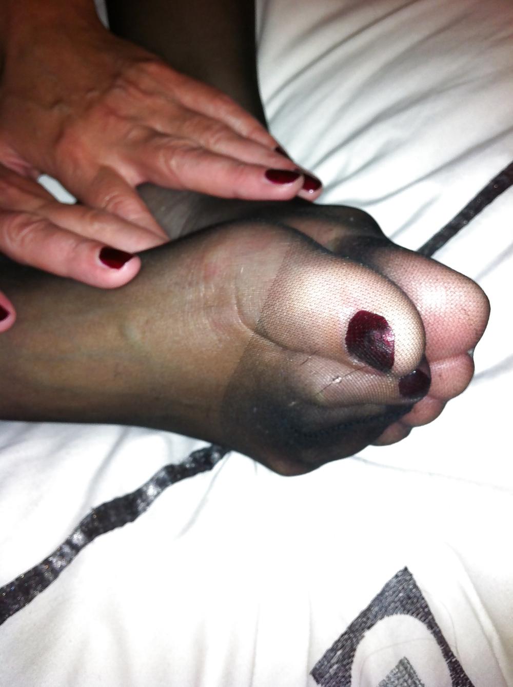 20P Her sexy stocking feet i coverd in my cum
