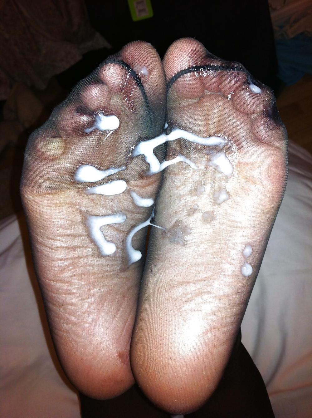 20P Her sexy stocking feet i coverd in my cum