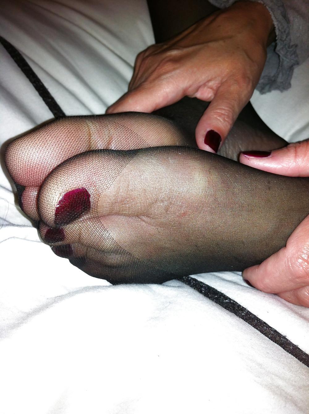 20P Her sexy stocking feet i coverd in my cum