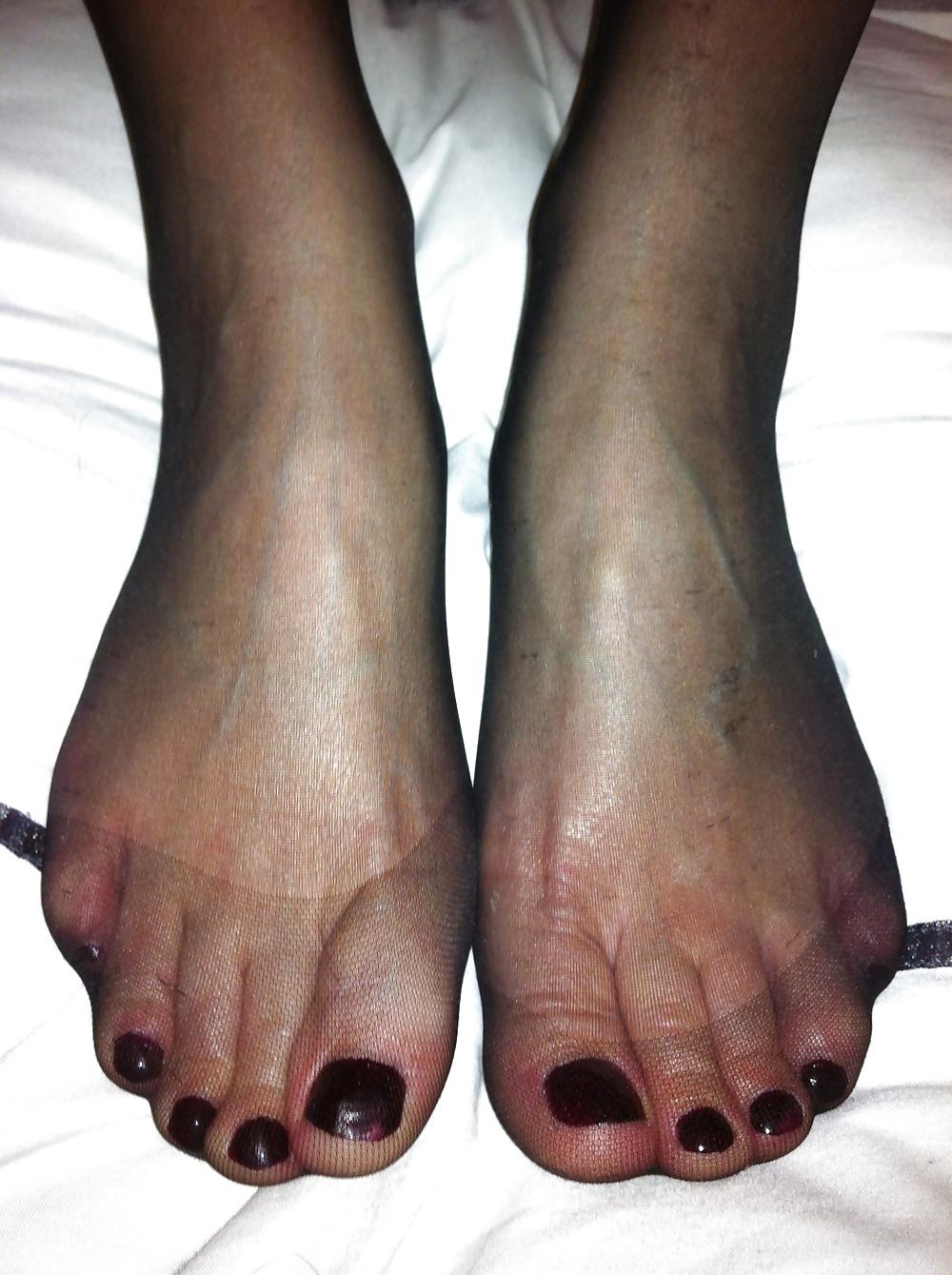 20P Her sexy stocking feet i coverd in my cum