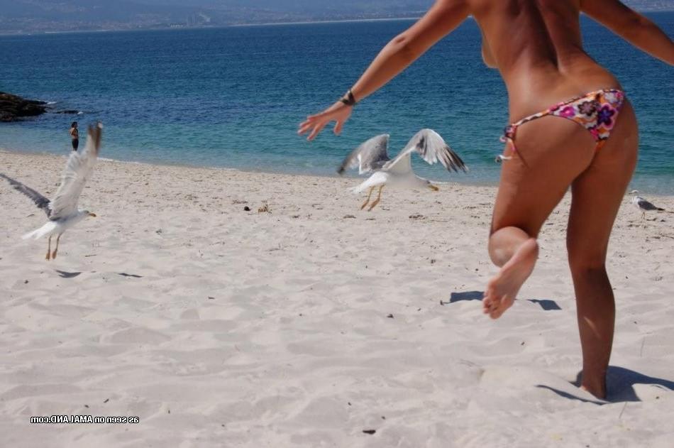 15P Three amateur lesbian teen GFs vacationing topless on the beach