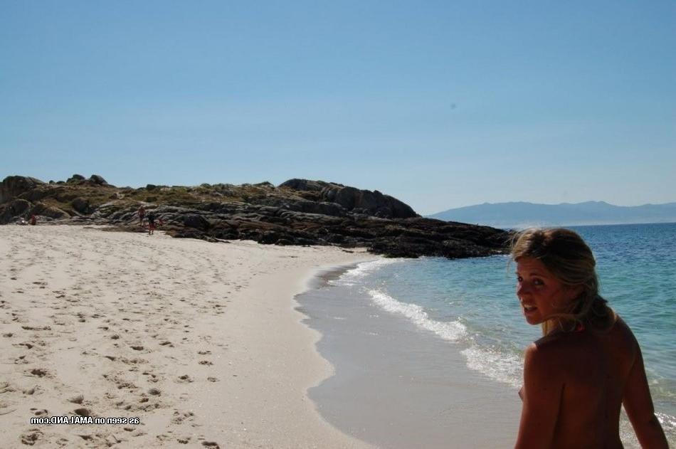 15P Three amateur lesbian teen GFs vacationing topless on the beach