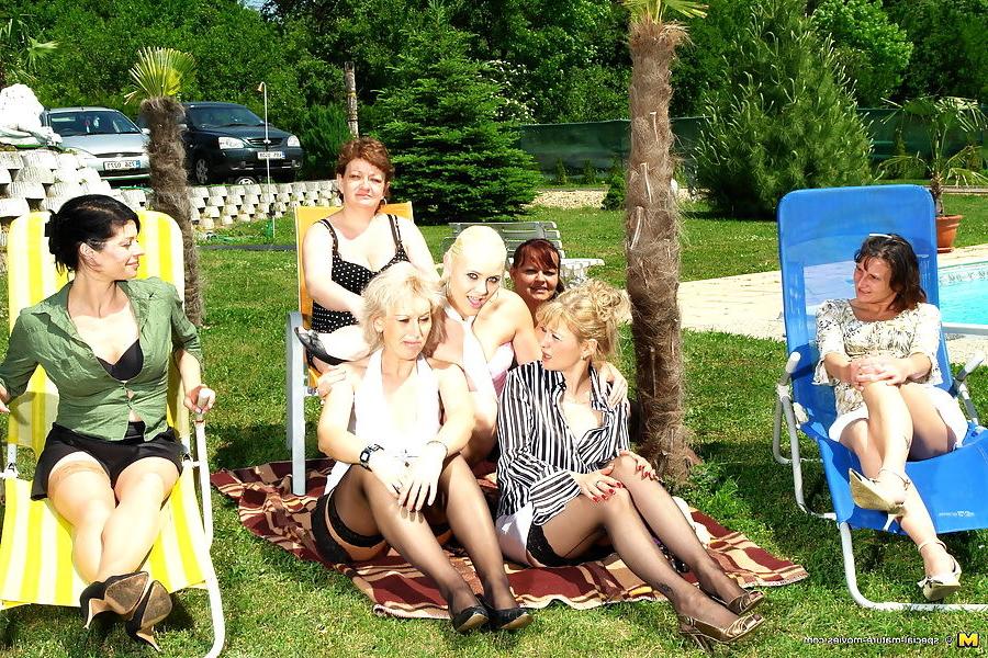 20P several amateur lesbian matures having fun in the garden
