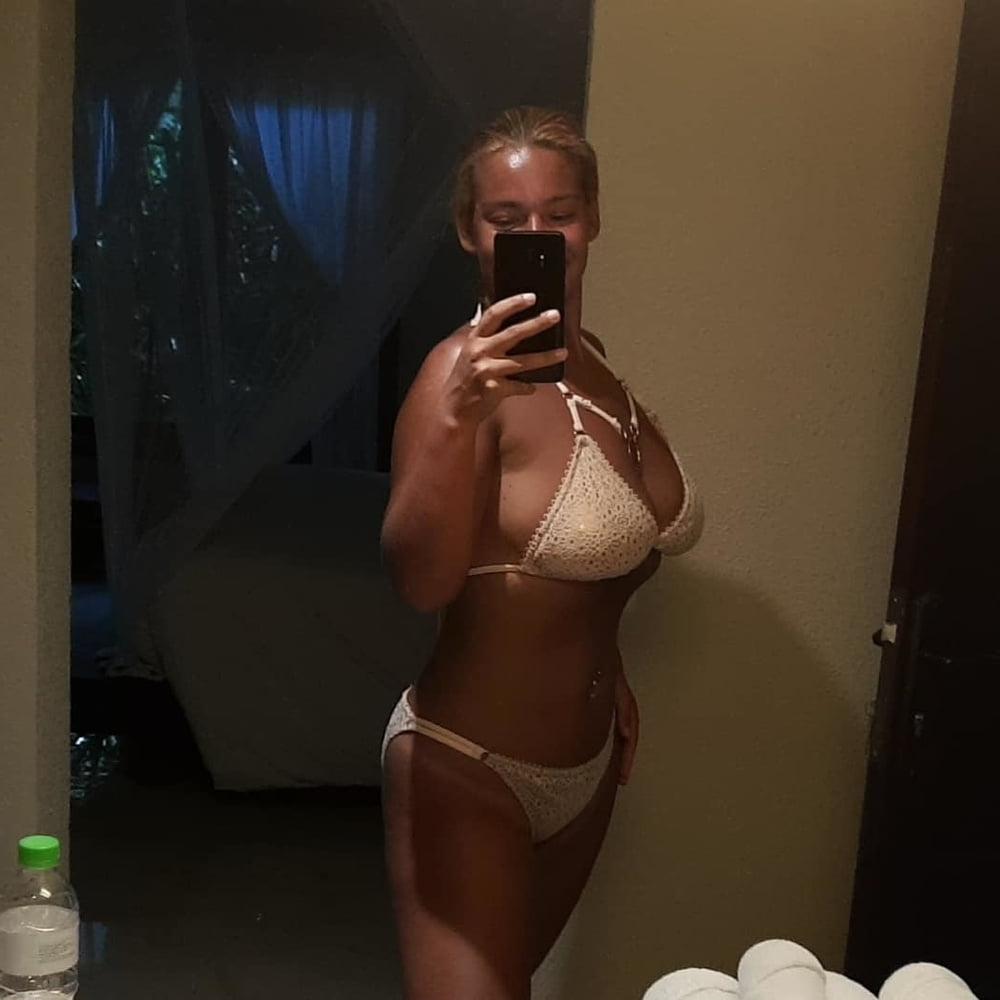 25P Amateur Dutch nurse Cheryl with huge tits in bikini