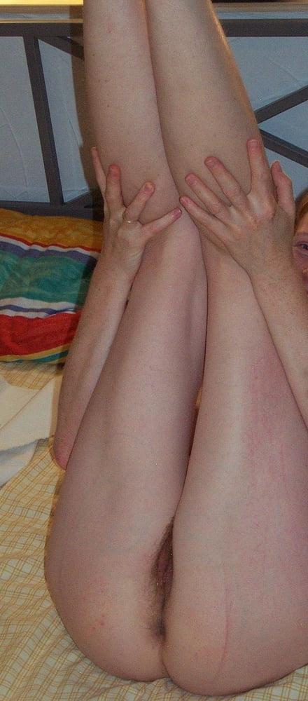25P Real amateur redhead shows her bush