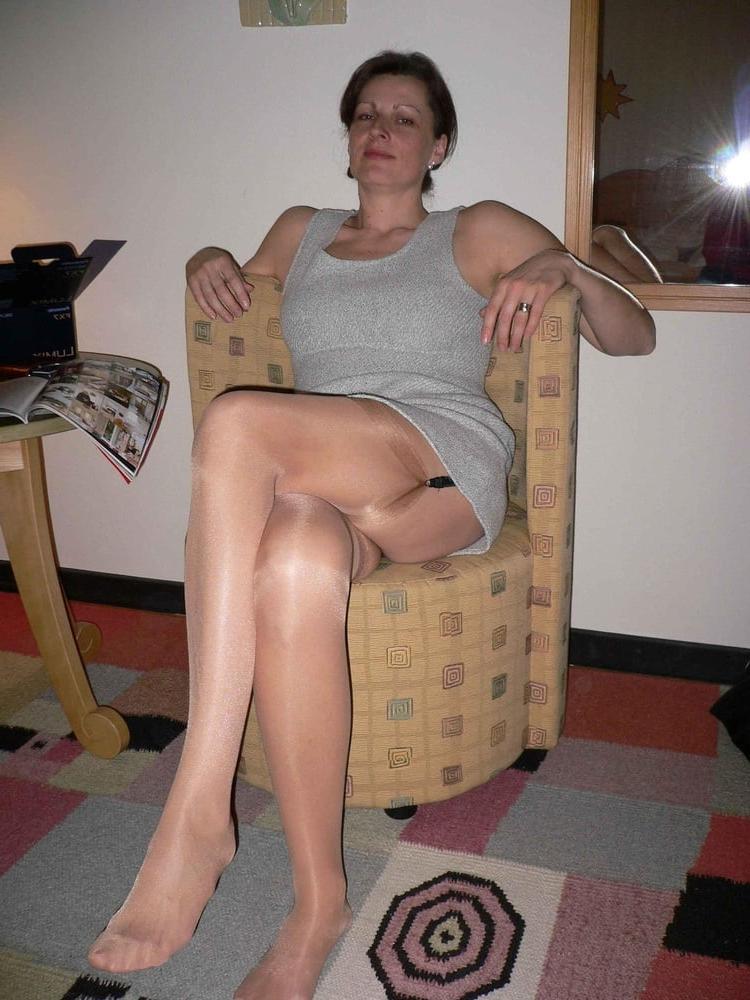 12P Amateur European Wife wearing shiny tan stockings