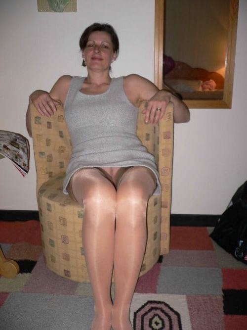 12P Amateur European Wife wearing shiny tan stockings